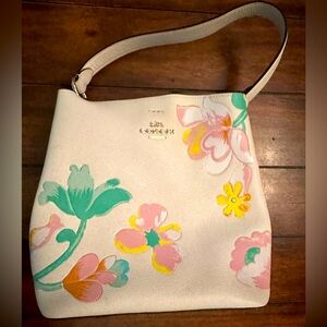 Cream flowered coach purse